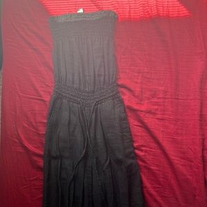 Black H&M romper. A synched waistline with a zipper on the side.